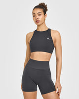 EasyLift™ High Neck Sports Bra with White Logo | Coal