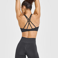 EasyLift™ High Neck Sports Bra with White Logo | Coal