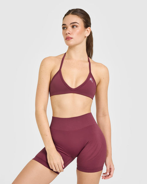 Oner Modal EnhanceLift™ Seamless Minimal Halter Neck Bralette with White Logo | Burnt Maroon