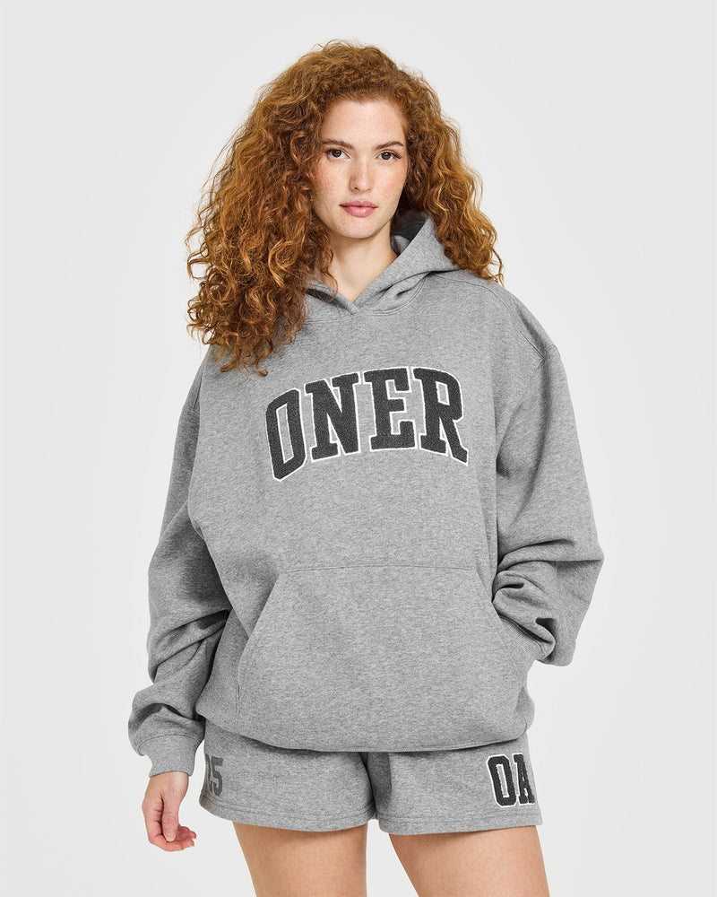 On オン　HOODIE プルオーバー　パーカー　グレー Foundations Oversized Oner 25 Hoodie in Charcoal Marl | Oner Active US