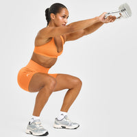 EffortlessLift™ Seamless Shorts with White Logo | Apricot Orange