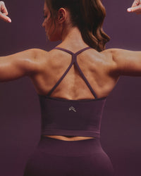 EnhanceLift™ Seamless Strappy Racer Vest with Built in Bra Shelf with Gray Logo | Light Blackberry Purple