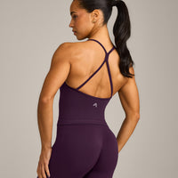 EnhanceLift™ Seamless Strappy Racer Vest with Built in Bra Shelf with Gray Logo | Light Blackberry Purple