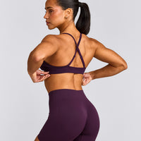 EnhanceLift™ Seamless Strappy Sports Bra with Gray Logo | Blackberry Purple