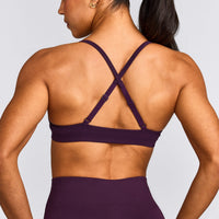 EnhanceLift™ Seamless Strappy Sports Bra with Gray Logo | Blackberry Purple