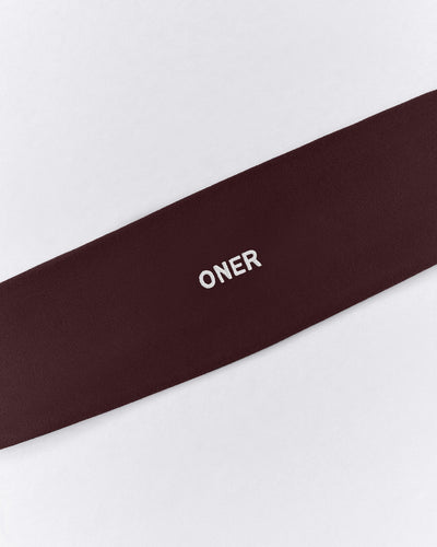 SoftMotion™ Headband with Gray Logo | Plum Brown