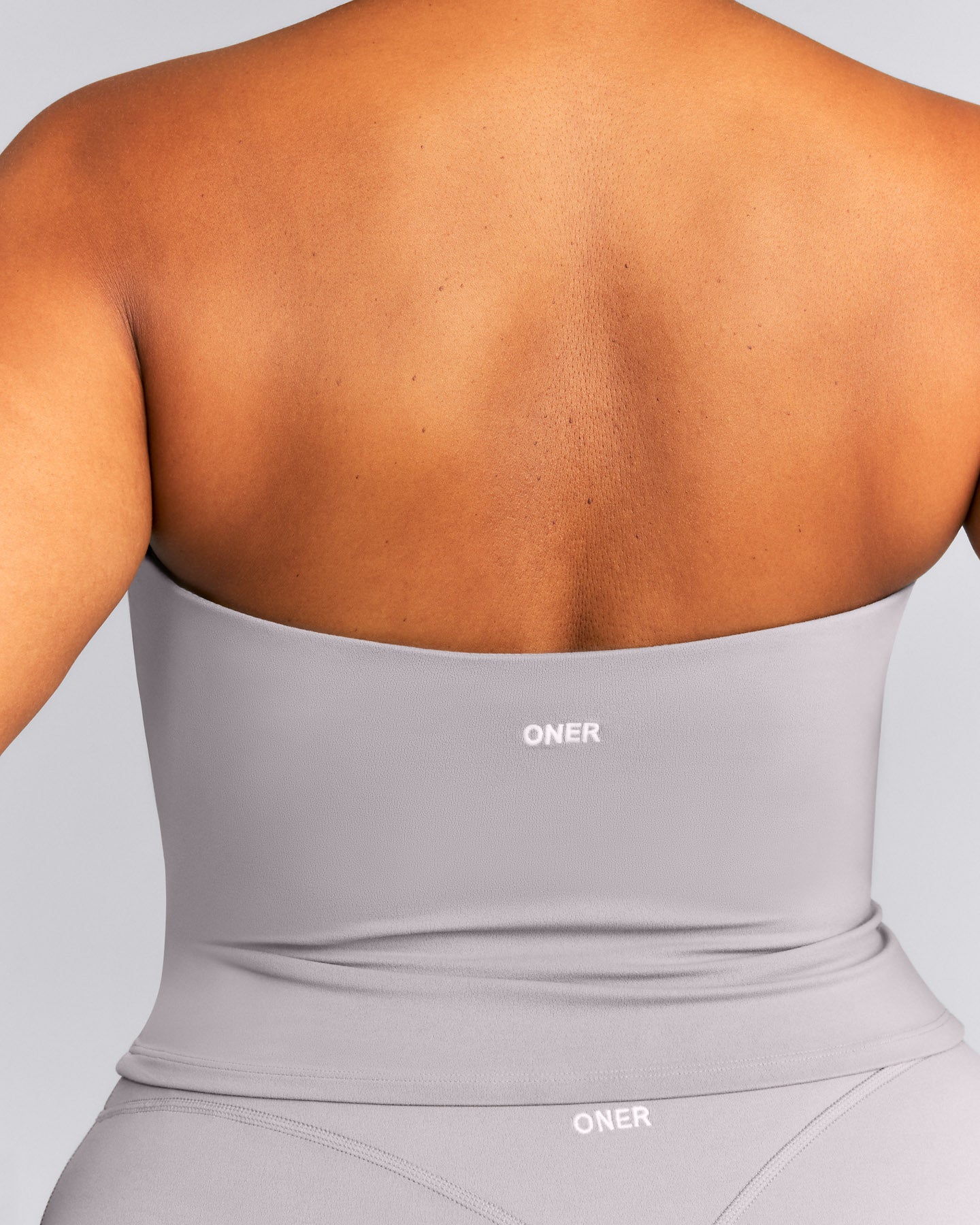 SoftMotion™ Strappy Halter Neck Mid Tank Top with Built in Bra Shelf New Branding | Zinc Gray