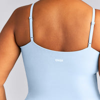 SoftMotion™ V Neck Mid Tank Top with Built in Bra Shelf New Branding | Mist Blue