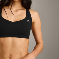 EasyLift™ Cross Back Sports Bra with Gray Logo | Black