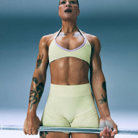 EnhanceLift™ Seamless Minimal Halter Neck Bralette with Gray Logo | Pastel Yellow
