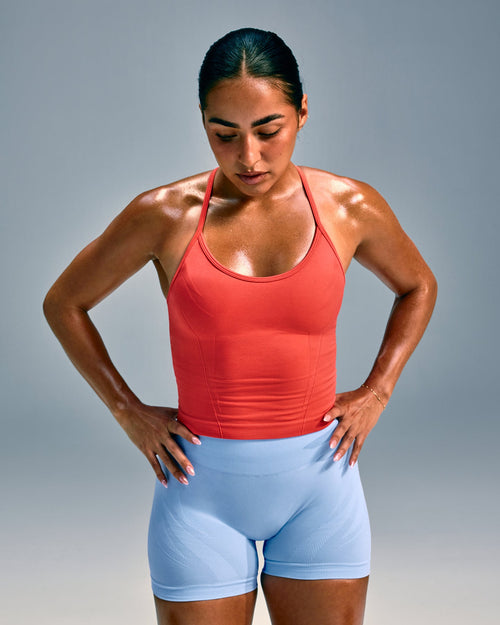 EnhanceLift™ Seamless Strappy Racer Tank Top with Built in Bra Shelf | Dark Charged Coral