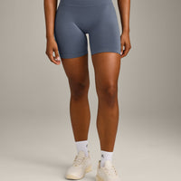 EffortlessLift™ Seamless Mid Rise Shorts with Gray Logo | Light Granite Blue
