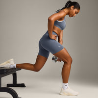 EffortlessLift™ Seamless Mid Rise Shorts with Gray Logo | Light Granite Blue
