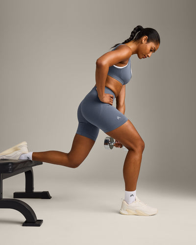 EffortlessLift™ Seamless Mid Rise Shorts with Gray Logo | Light Granite Blue