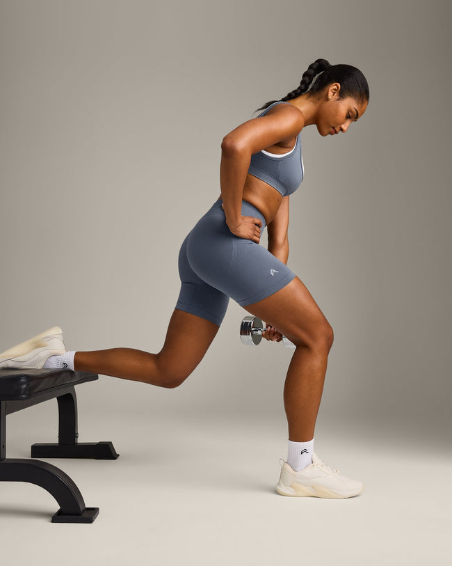 EffortlessLift™ Seamless Mid Rise Shorts with Gray Logo | Light Granite Blue