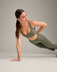 EasyLift™ Cross Back Sports Bra with Gray Logo | Alpine Green