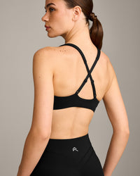 EasyLift™ Cross Back Sports Bra with Gray Logo | Black