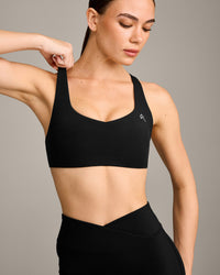 EasyLift™ Cross Back Sports Bra with Gray Logo | Black