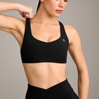 EasyLift™ Cross Back Sports Bra with Gray Logo | Black