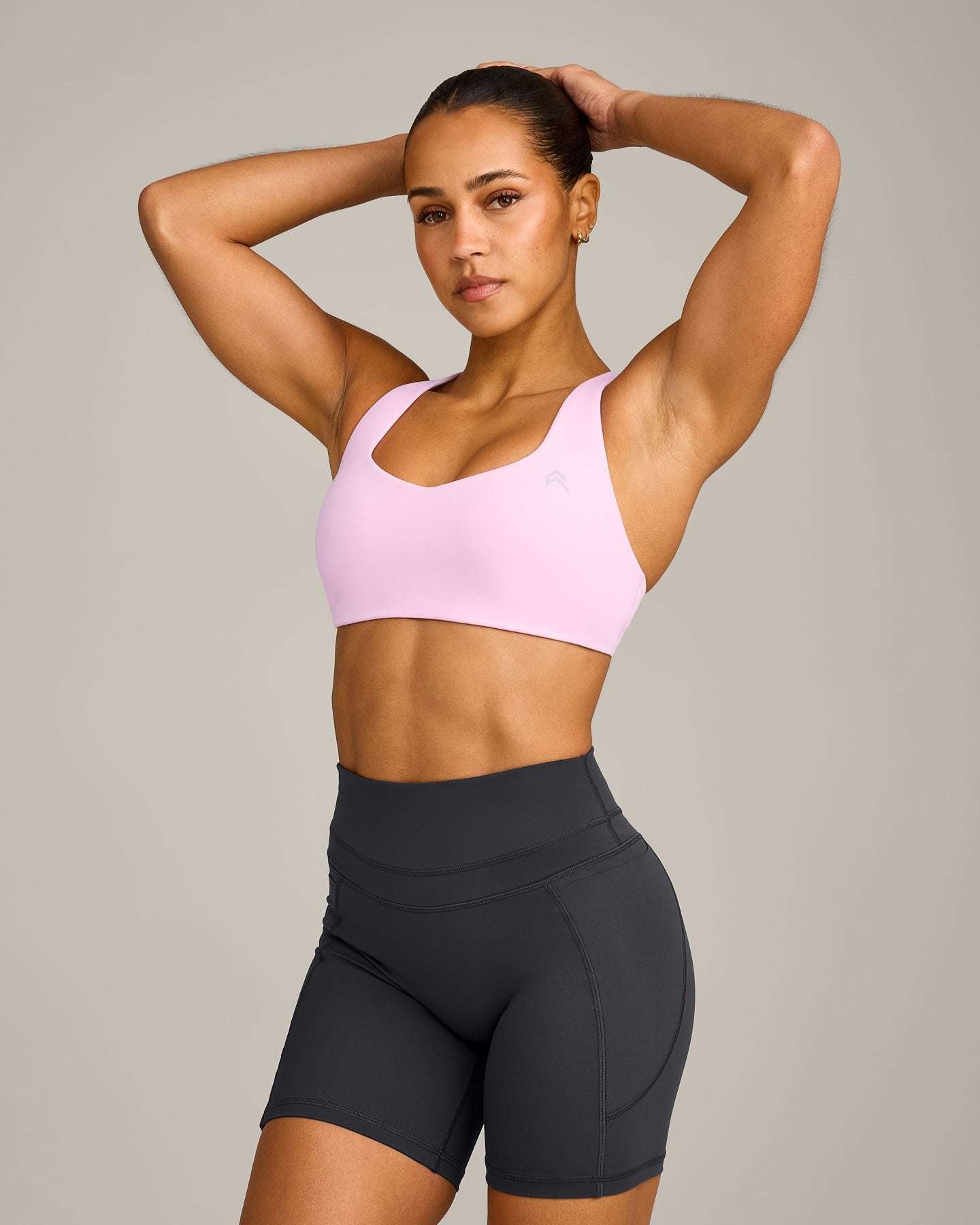 EasyLift™ Cross Back Sports Bra with Gray Logo | Chalk Pink
