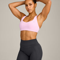 EasyLift™ Cross Back Sports Bra with Gray Logo | Chalk Pink