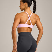 EasyLift™ Cross Back Sports Bra with Gray Logo | Chalk Pink