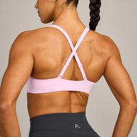EasyLift™ Cross Back Sports Bra with Gray Logo | Chalk Pink