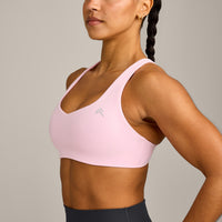 EasyLift™ Cross Back Sports Bra with Gray Logo | Chalk Pink