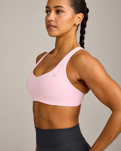EasyLift™ Cross Back Sports Bra with Gray Logo | Chalk Pink