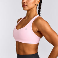 EasyLift™ Cross Back Sports Bra with Gray Logo | Chalk Pink