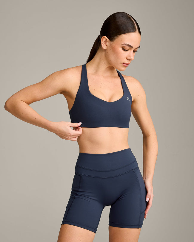 EasyLift™ Cross Back Sports Bra with Gray Logo | True Blue