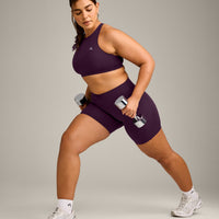 EasyLift™ High Neck Sports Bra with Gray Logo | Blackberry Purple