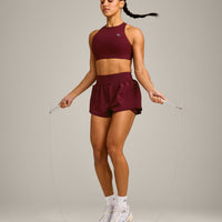 EasyLift™ High Neck Sports Bra with Gray Logo | Rosewood