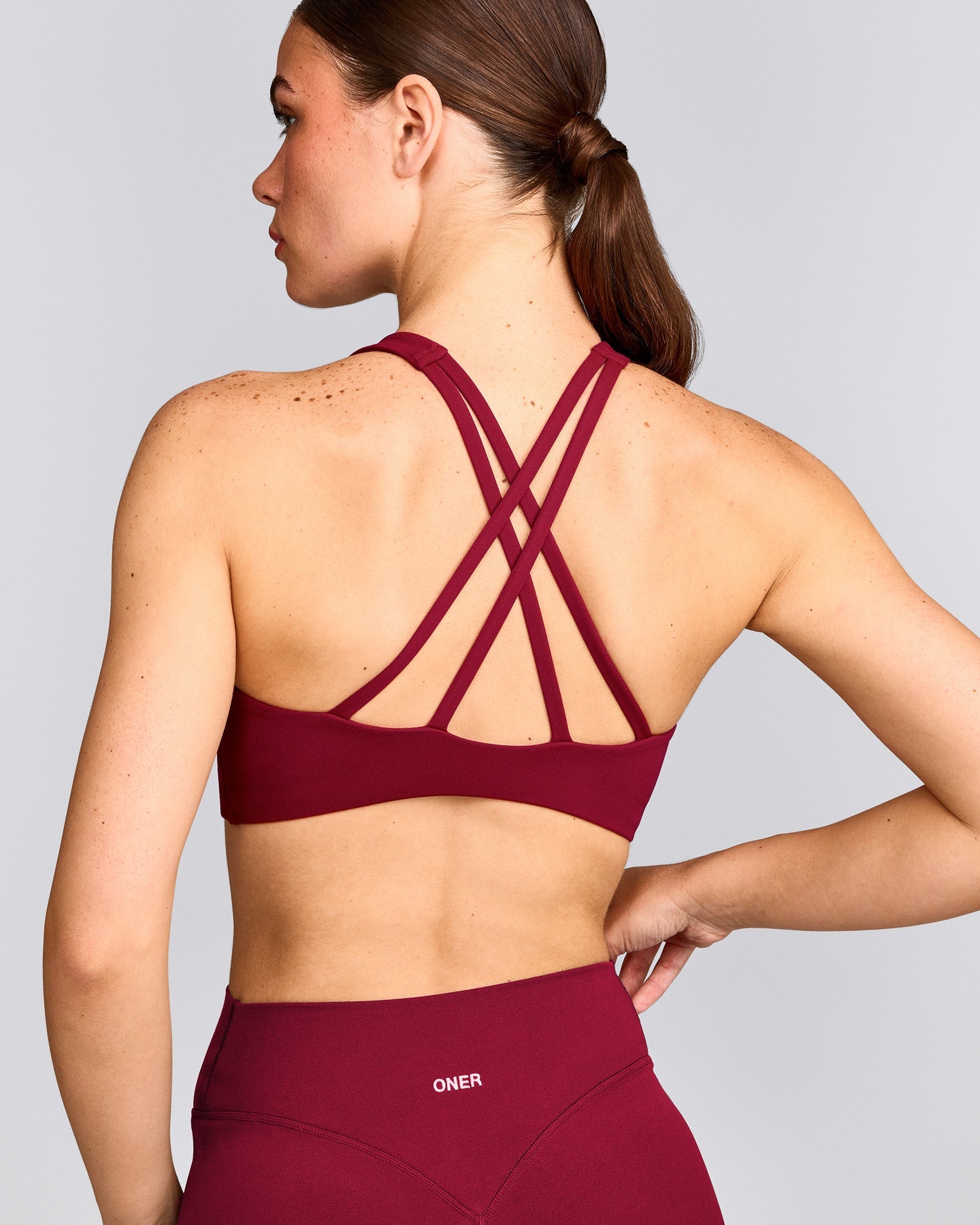 EasyLift™ High Neck Sports Bra with Gray Logo | Ruby Red