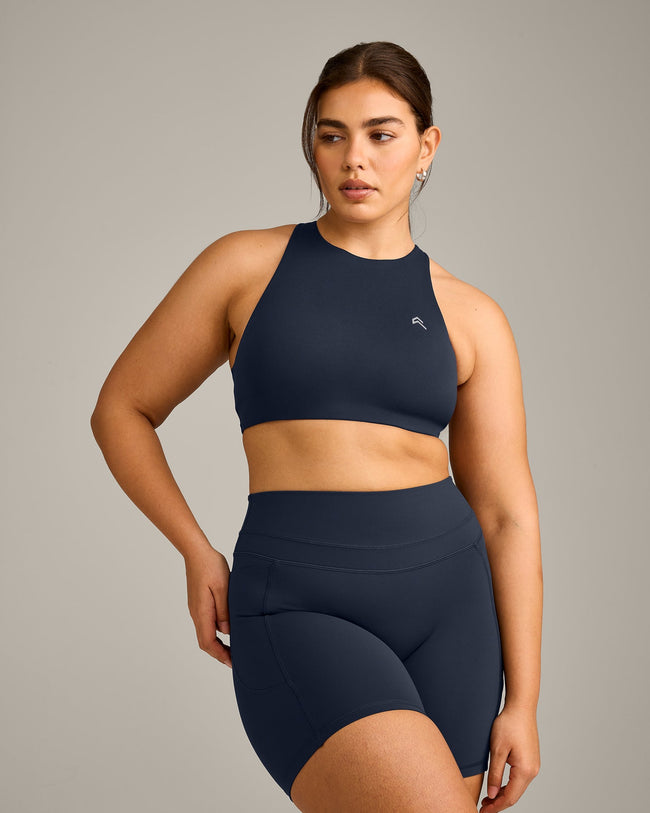 EasyLift™ High Neck Sports Bra with Gray Logo | True Blue