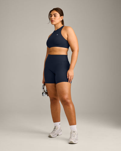 EasyLift™ High Neck Sports Bra with Gray Logo | True Blue