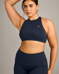EasyLift™ High Neck Sports Bra with Gray Logo | True Blue