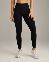 EffortlessLift™ Seamless Mid Rise Leggings with Gray Logo | Black