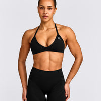 EnhanceLift™ Seamless Minimal Halter Neck Bralette with Gray Logo | Black