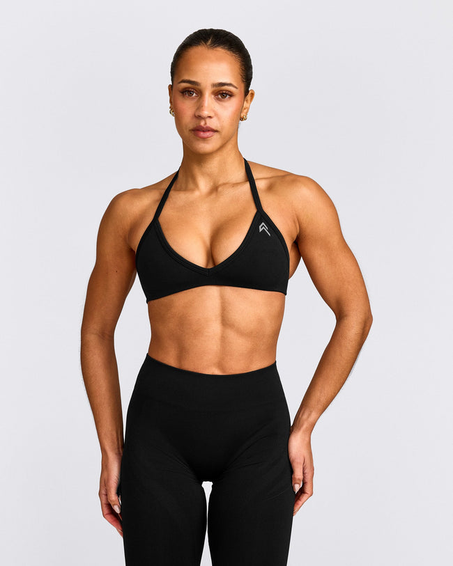 EnhanceLift™ Seamless Minimal Halter Neck Bralette with Gray Logo | Black