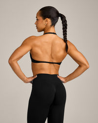 EnhanceLift™ Seamless Minimal Halter Neck Bralette with Gray Logo | Black