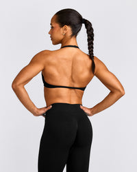 EnhanceLift™ Seamless Minimal Halter Neck Bralette with Gray Logo | Black