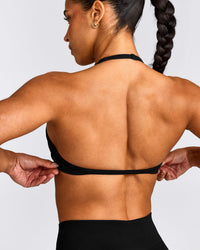 EnhanceLift™ Seamless Minimal Halter Neck Bralette with Gray Logo | Black