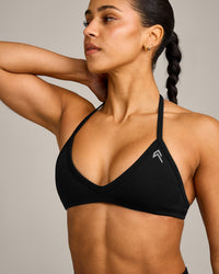 EnhanceLift™ Seamless Minimal Halter Neck Bralette with Gray Logo | Black