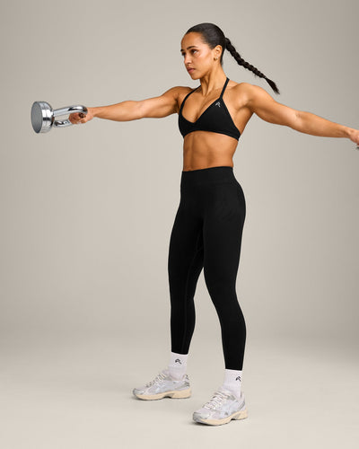 EnhanceLift™ Seamless Minimal Halter Neck Bralette with Gray Logo | Black