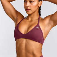 EnhanceLift™ Seamless Minimal Halter Neck Bralette with Gray Logo | Burnt Maroon