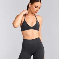 EnhanceLift™ Seamless Minimal Halter Neck Bralette with Gray Logo | Coal