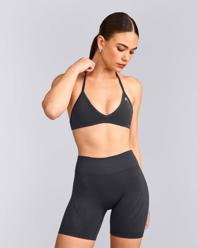 EnhanceLift™ Seamless Minimal Halter Neck Bralette with Gray Logo | Coal