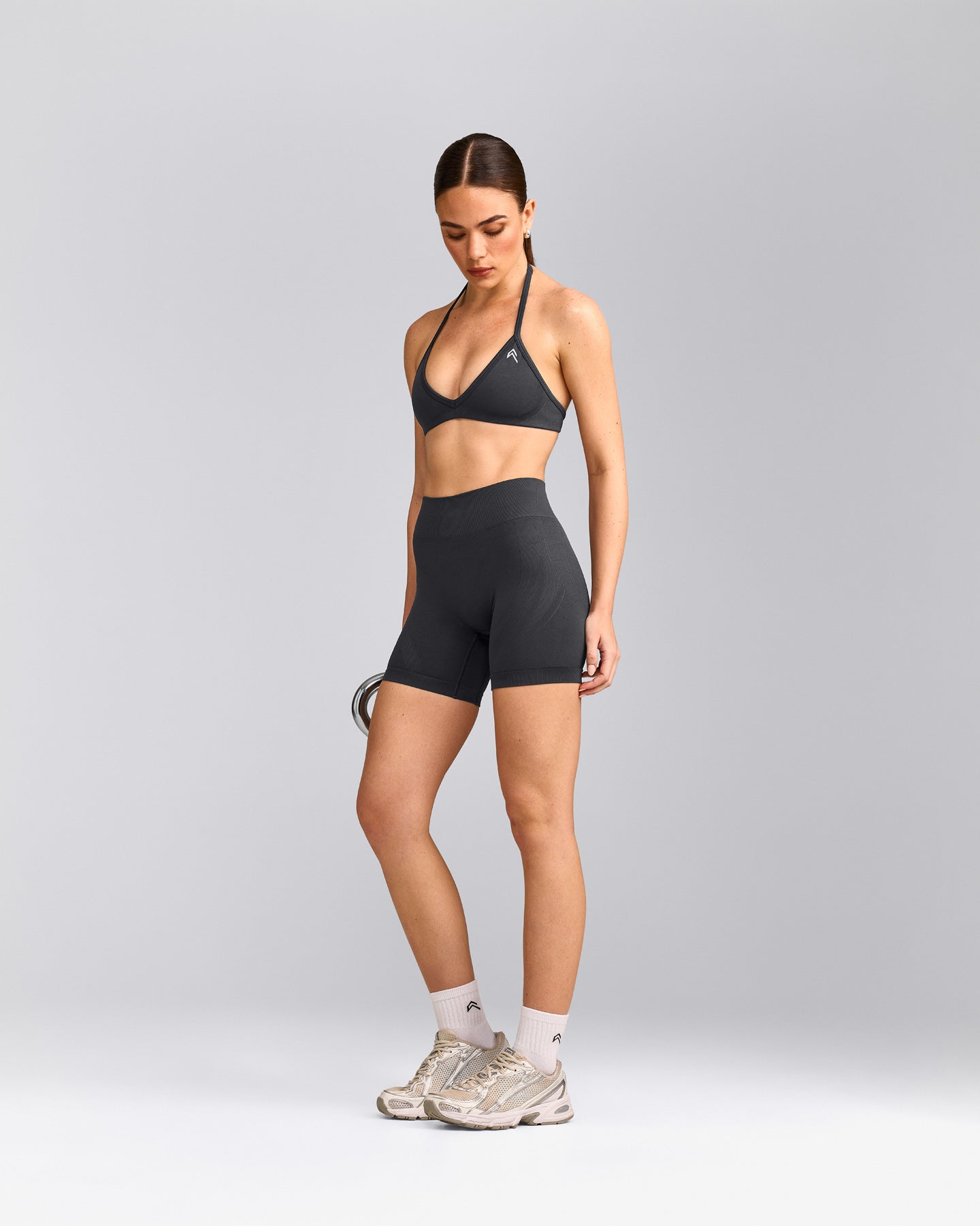 EnhanceLift™ Seamless Minimal Halter Neck Bralette with Gray Logo | Coal