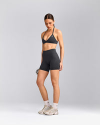 EnhanceLift™ Seamless Minimal Halter Neck Bralette with Gray Logo | Coal